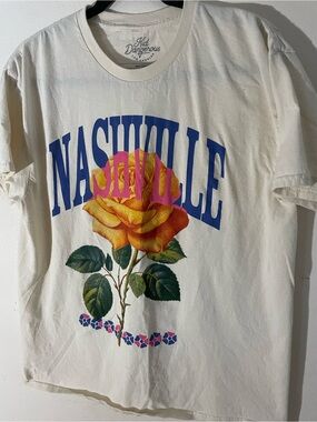 Kid Dangerous Cream Tee with Blue Nashville Text and Yellow Rose Accent